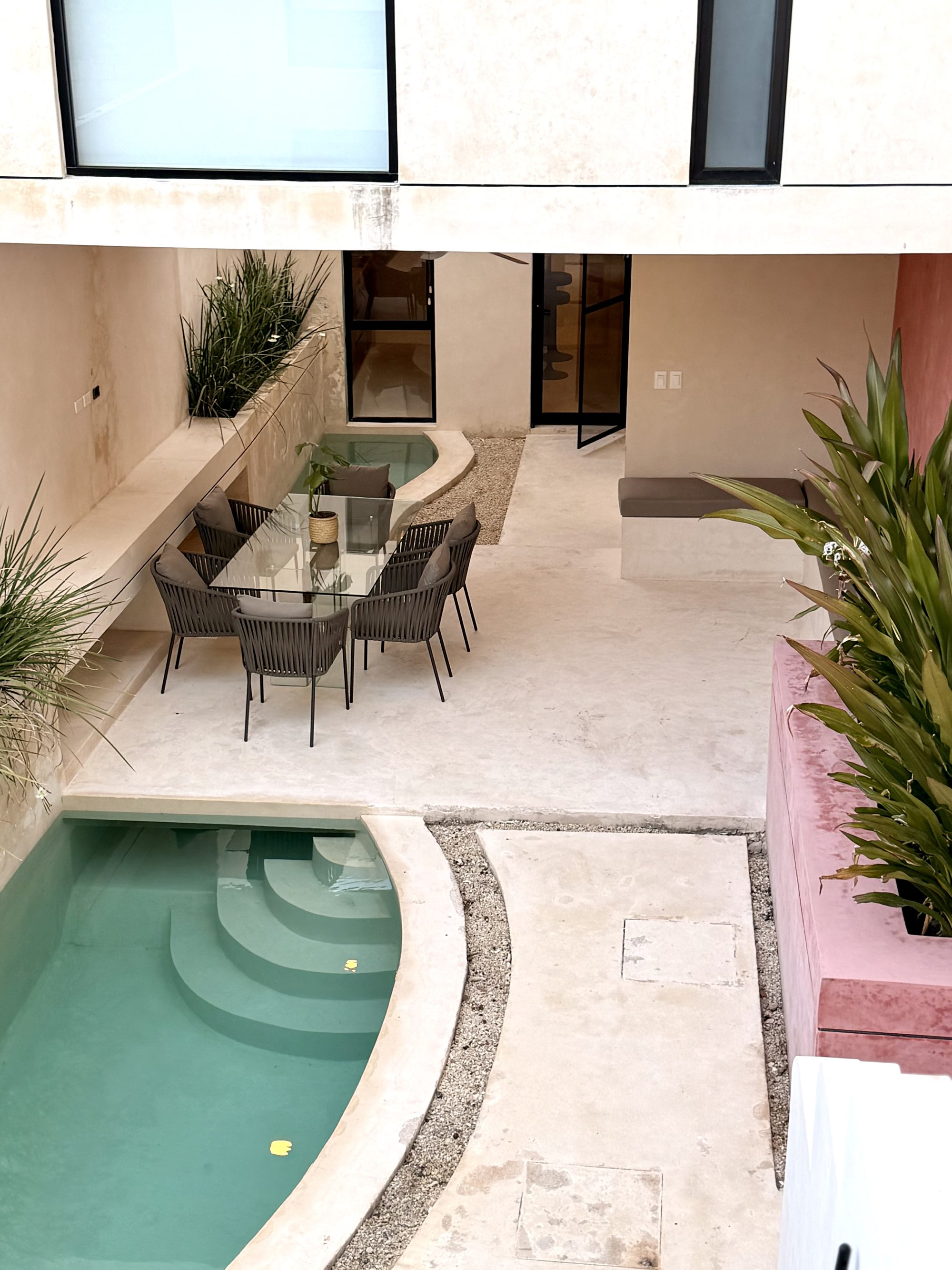 Casa Armonía's courtyard with plunge pool and outdoor dining